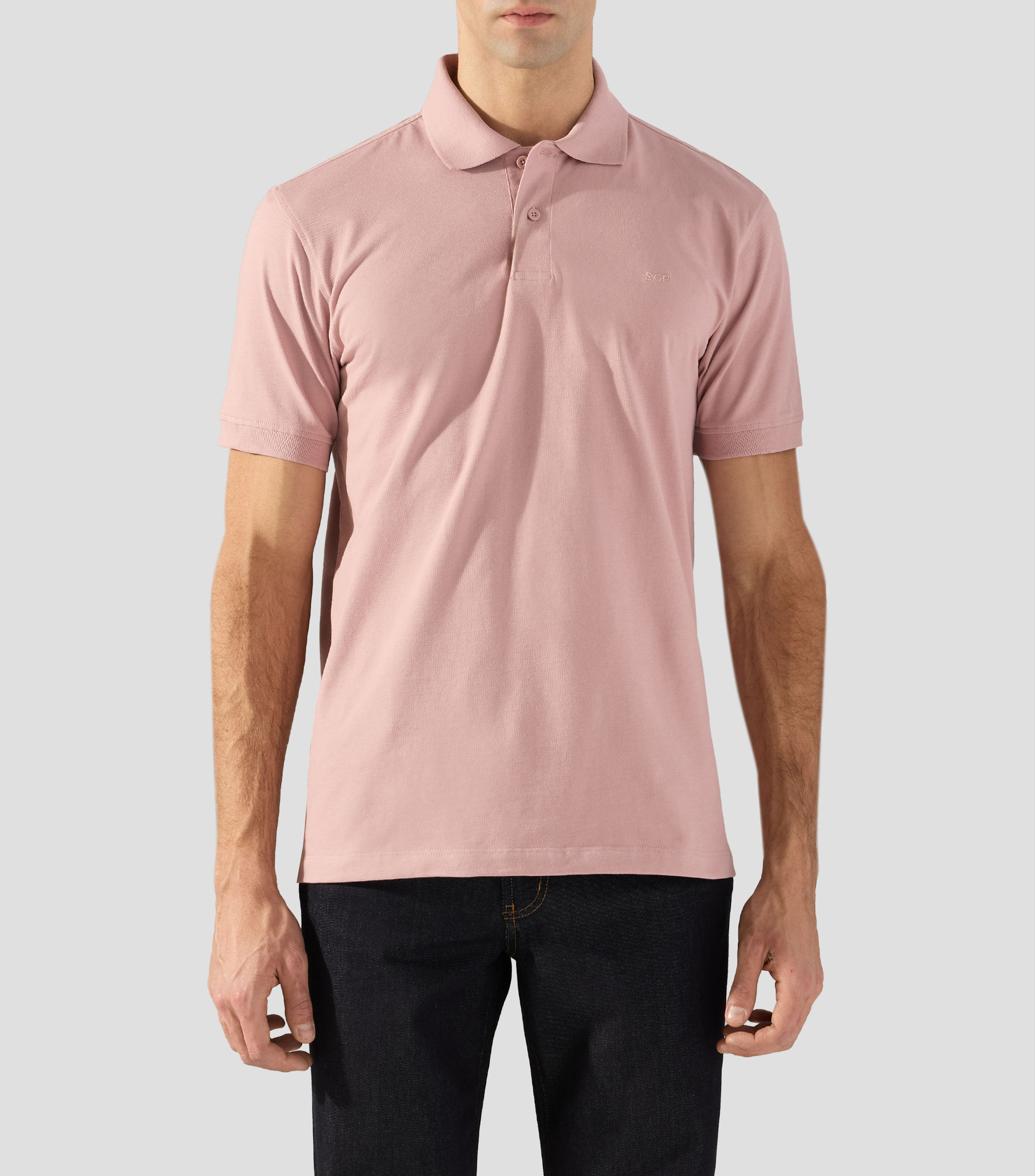 Playera tipo polo con manga corta lisa Hombre